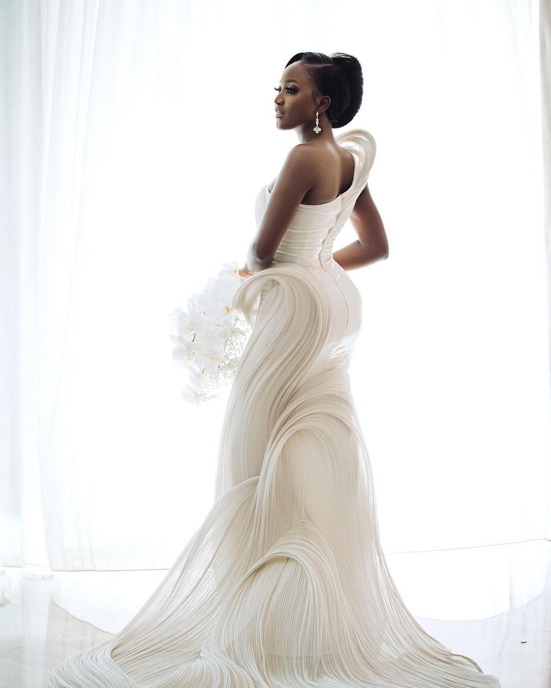 Wedding Gowns: Top 10 Iconic White Dresses on Nigerian Brides